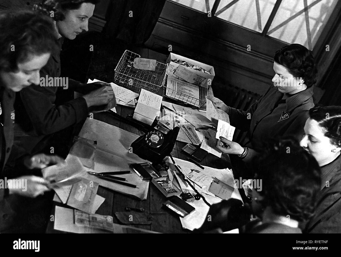 office, female clerks sorting mail, Great Britain, 1940s, Additional-Rights-Clearance-Info-Not-Available Stock Photo