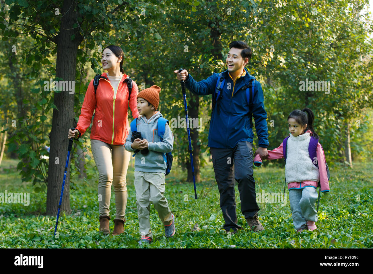 Happy family hiking hi-res stock photography and images - Alamy