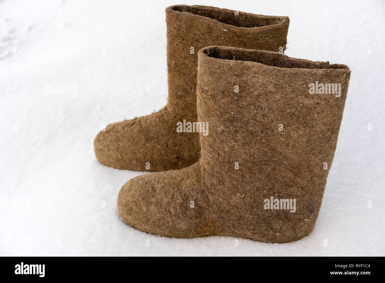 Old national traditional Russian winter footwear is felt boot. Name valenki literally means made by felting. Stock Photo