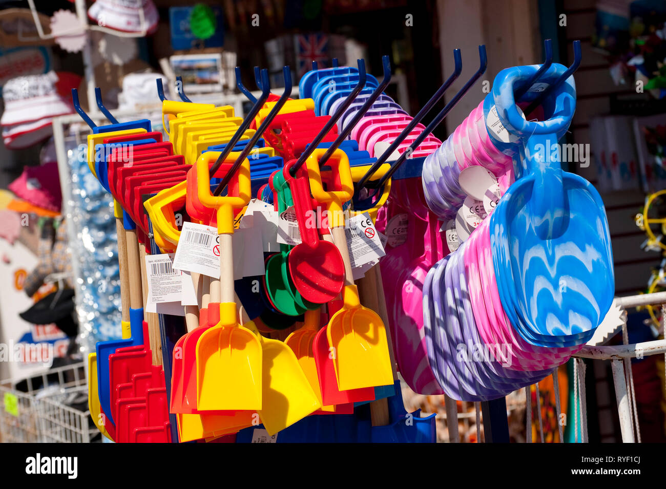 Colourful childrens plastic toys for sale in a shop in the seaside town