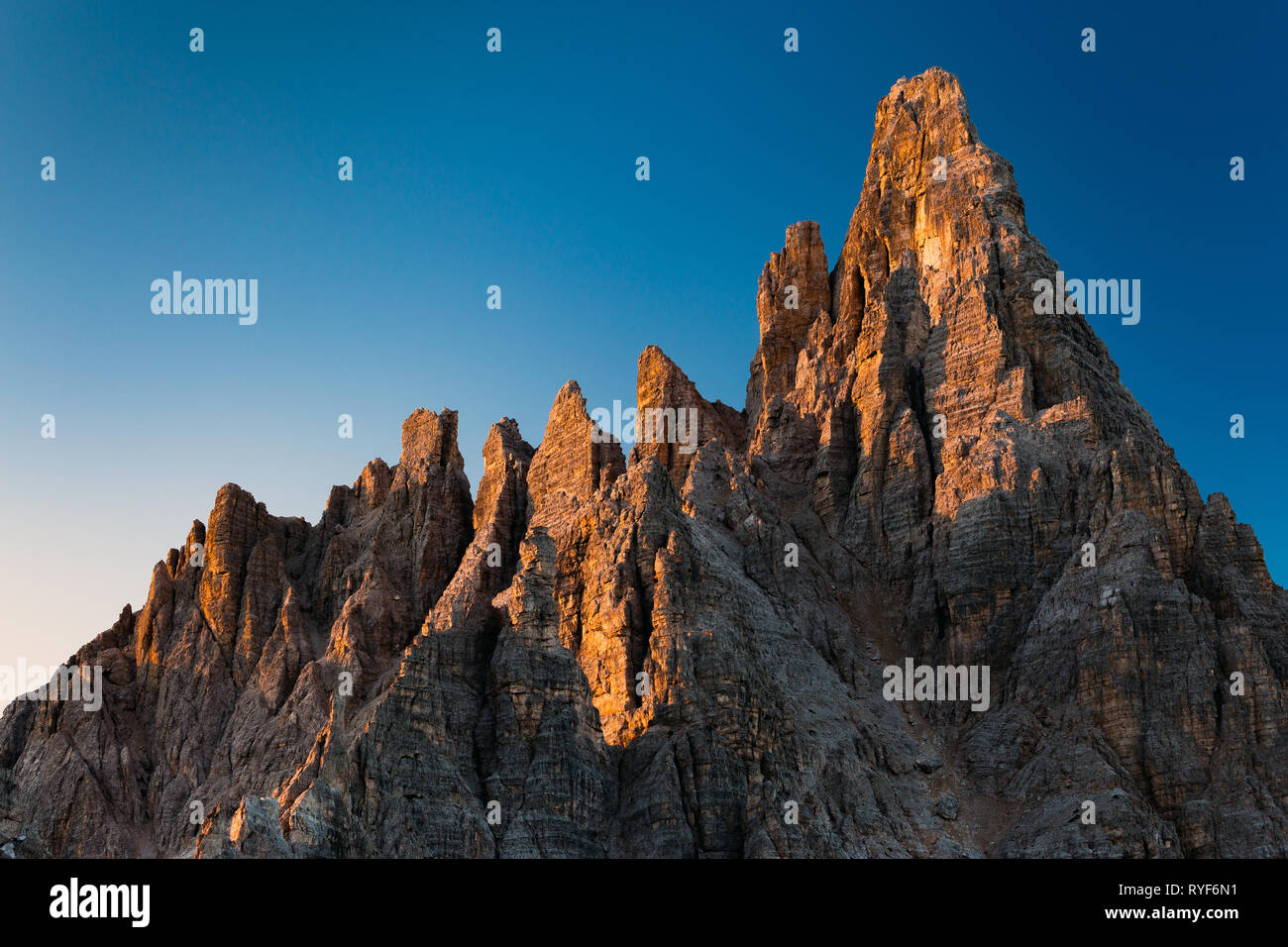 Alpenglow at sunrise on Monte Paterno mountain. The Sexten Dolomites. Italian Alps. Europe. Stock Photo