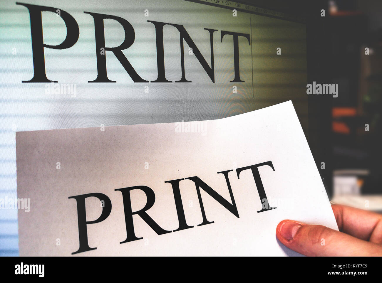 printer hand hold a print sheet with word processor software screen on ...