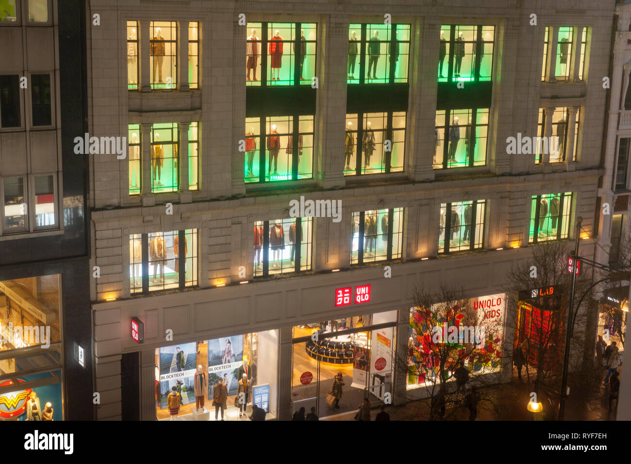 The outside of the Uniqlo clothing store on a rainy night in Oxford Street,  London Stock Photo - Alamy