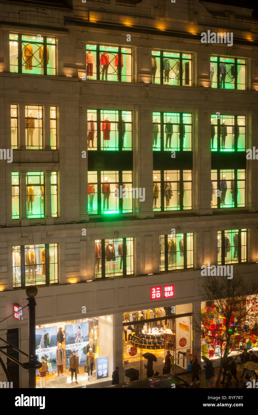 The outside of the Uniqlo clothing store on a rainy night in Oxford Street,  London Stock Photo - Alamy
