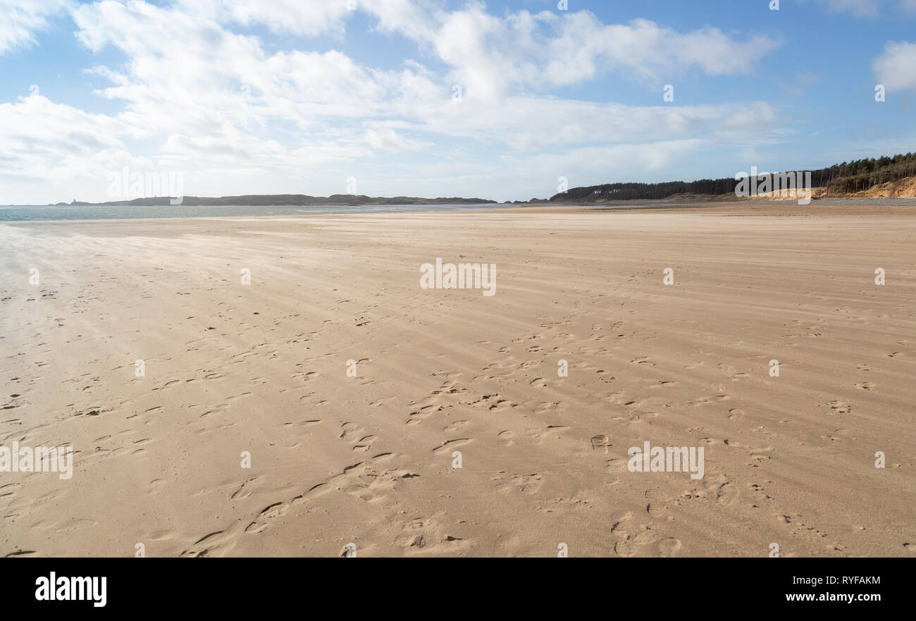 Low Tide Sandy Beach At Newborough In Anglesey North Wales Stock Photo Low Tide Sandy Beach At Newborough In Anglesey North Wales Stock Photo