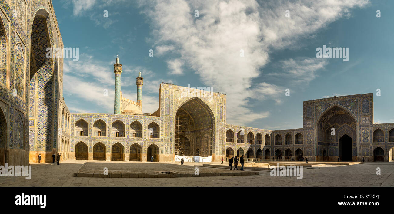 Panoramic view of Shah Abbas Mosque, unesco heritage site, inside courtyard with iwans, Esfahan, Iran Stock Photo