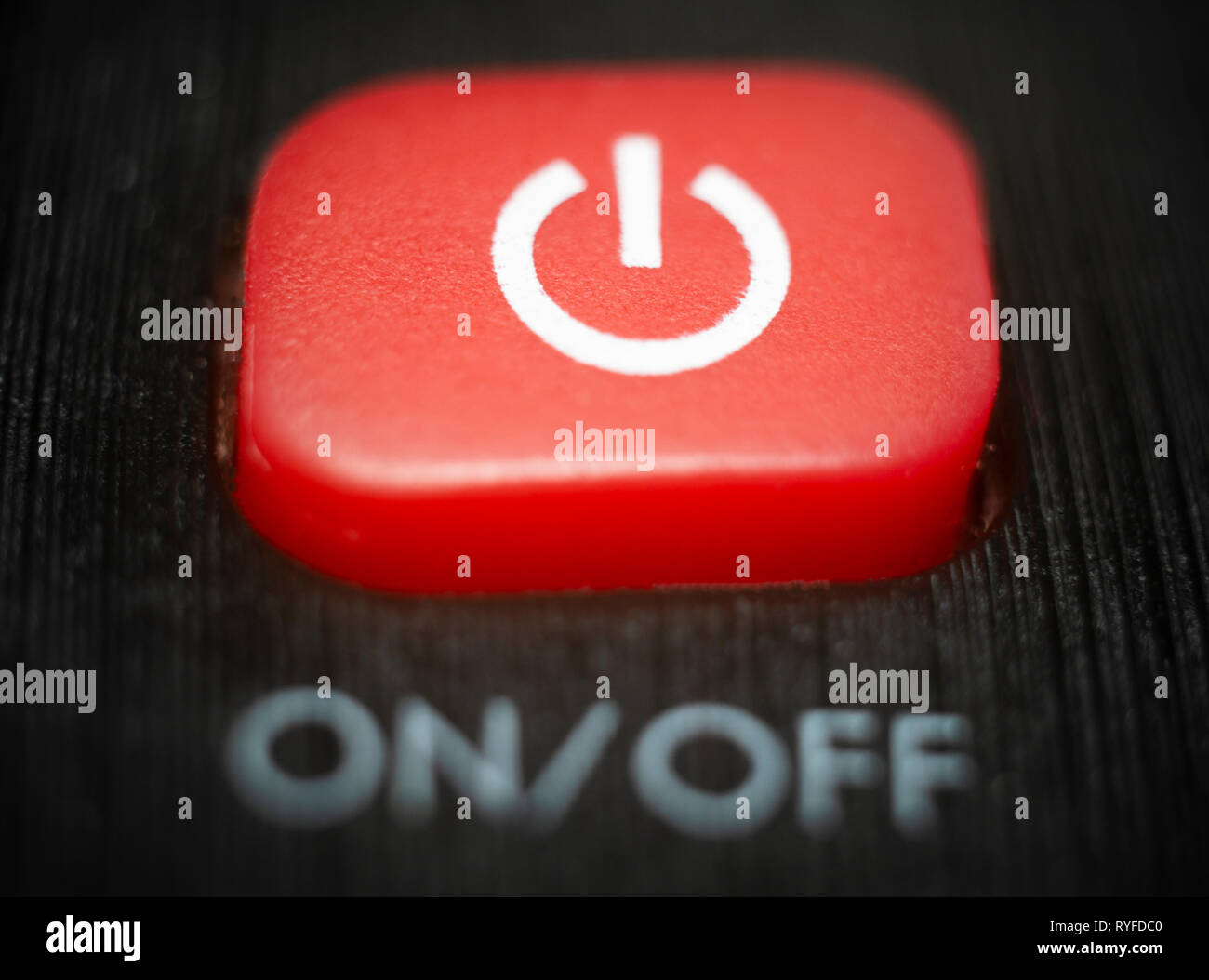 A red on and off power button on a TV remote control Stock Photo Alamy