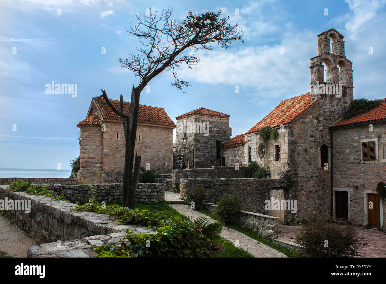 The churches of Santa Maria In Punta and St. Sava, in Trg Između Crkava, the old town of Budva, Montenegro Stock Photo