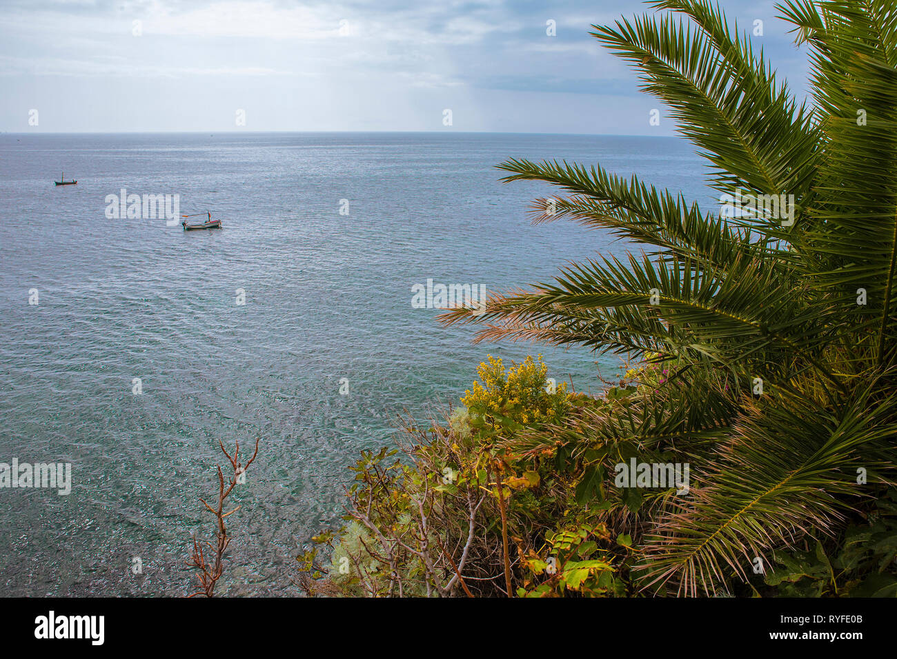 Two small fishing boats on the Adriatic seen from the ramparts of the
