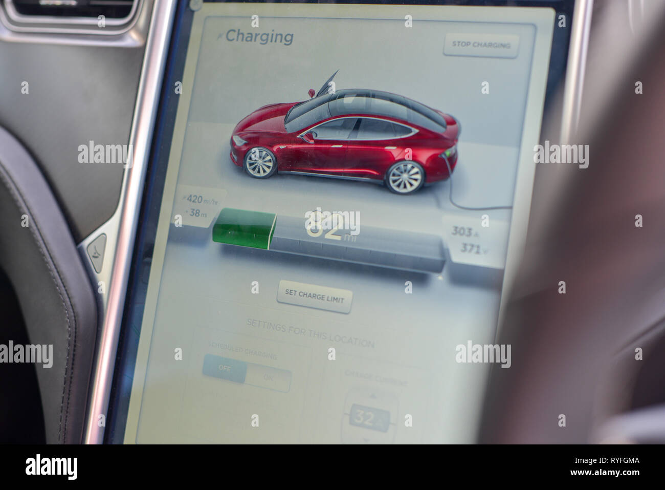 Tesla Model S electric car charging at a Supercharger station Stock ...