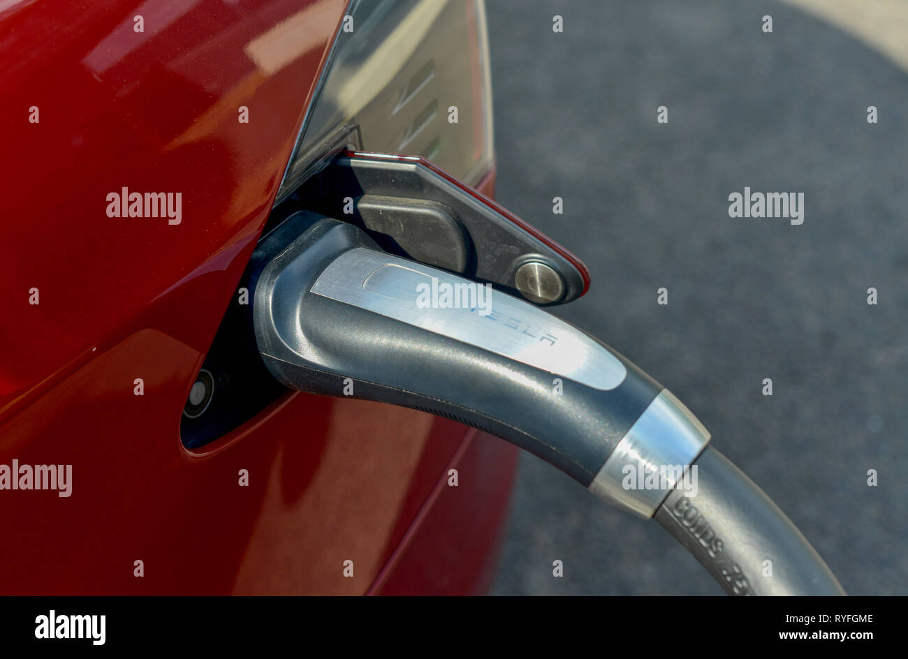 Tesla Model S electric car charging at a Supercharger station Stock ...