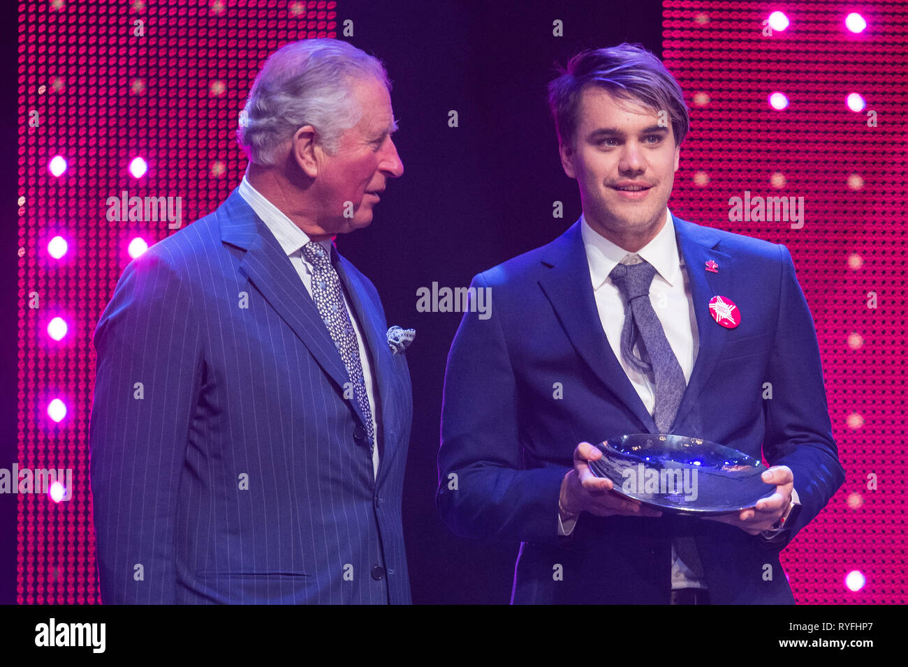 The Prince of Wales with winners of Mentor of the Year Award Rahul Mehra onstage at the annual Prince's Trust Awards at the London Palladium. Stock Photo