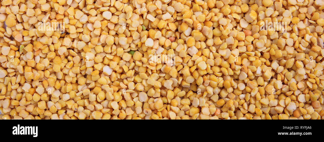 Split peas. Yellow orange color split peeled peas uncooked full ...