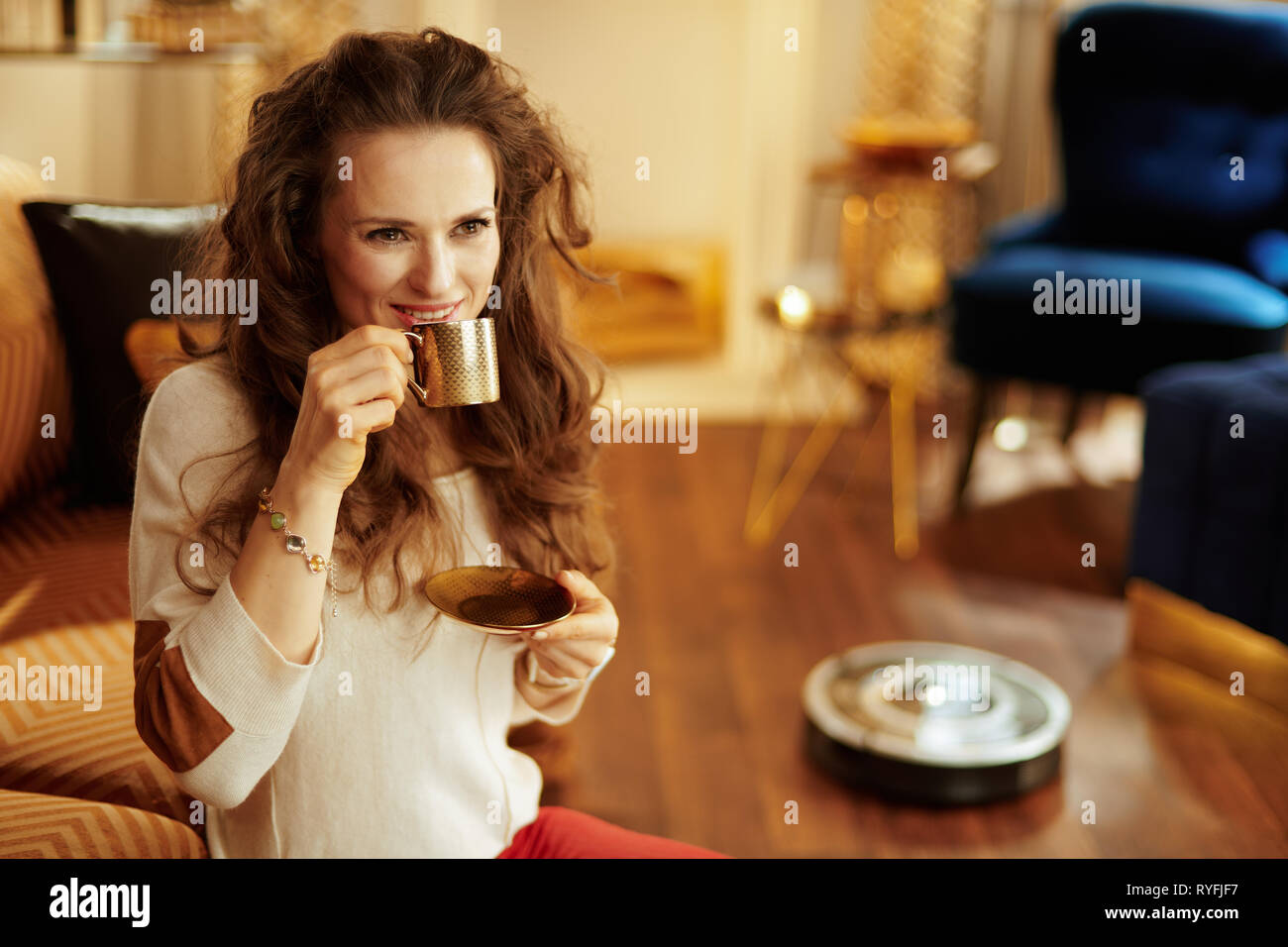 Smiling Young Woman With Long Brunette Hair In The Modern Living