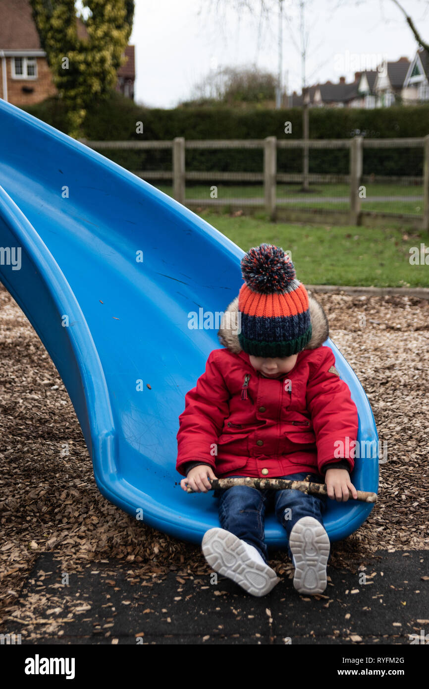 red coat and bobble hat Stock Photo 