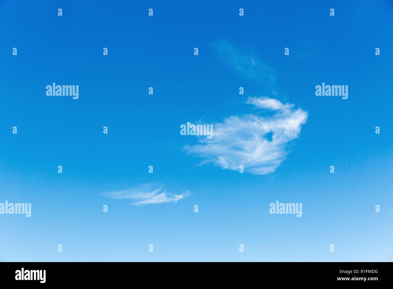 blue sky and fluffy clouds background Stock Photo - Alamy