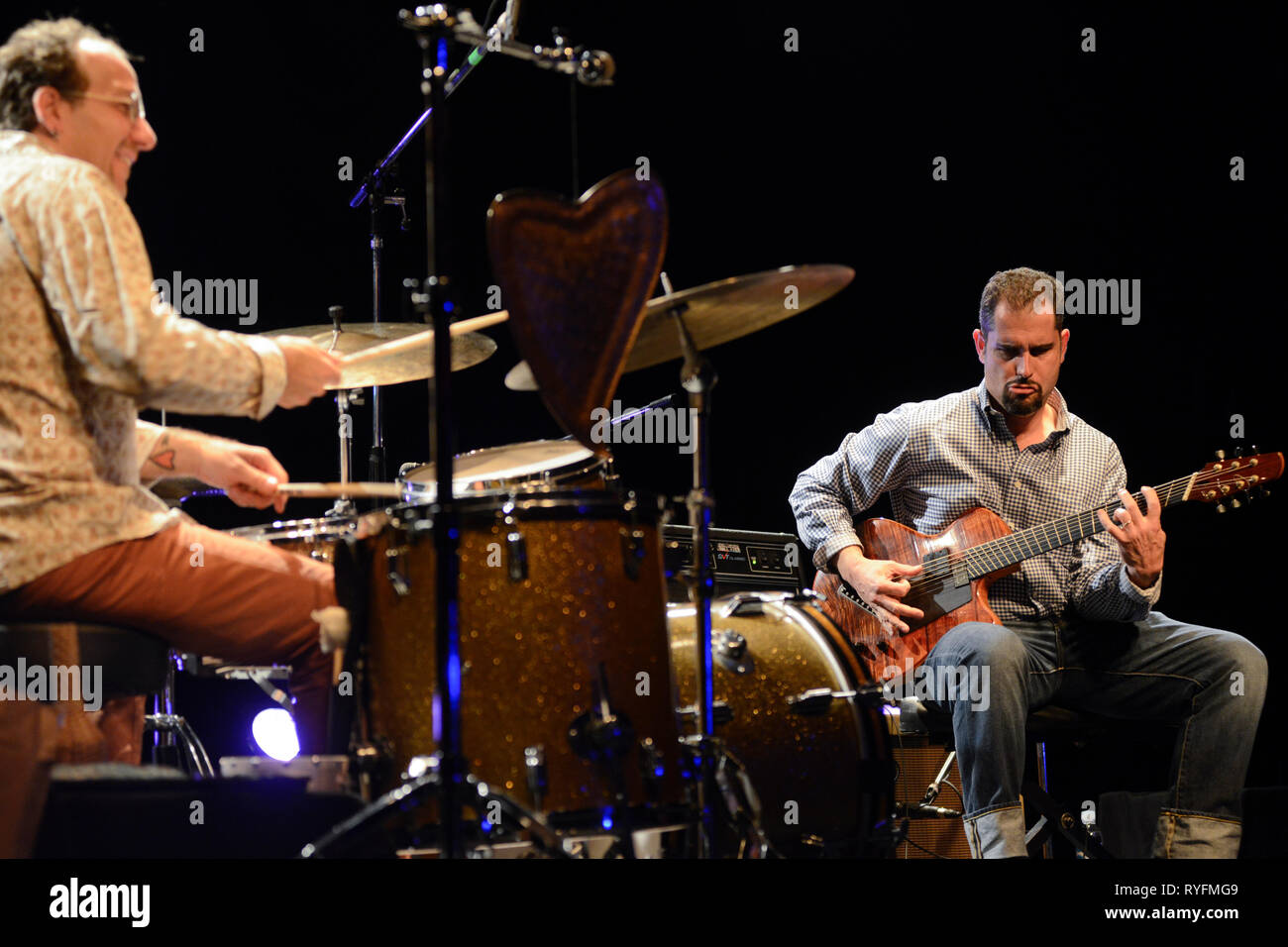 Jazz duo Charlie Hunter (guitar) and Scott Amendola (drums) playing live in concert Stock Photo