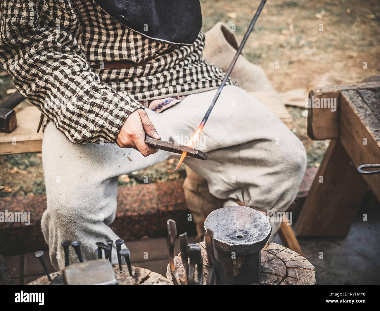 Medieval blacksmith hands process hi-res stock photography and images ...