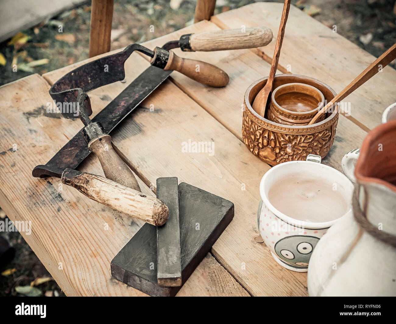 Old woodworking hand tool drawknife, drawshave, drawing knife, shaving  knifewooden in a carpentry workshop on dirty rustic table with old clay  Stock Photo - Alamy
