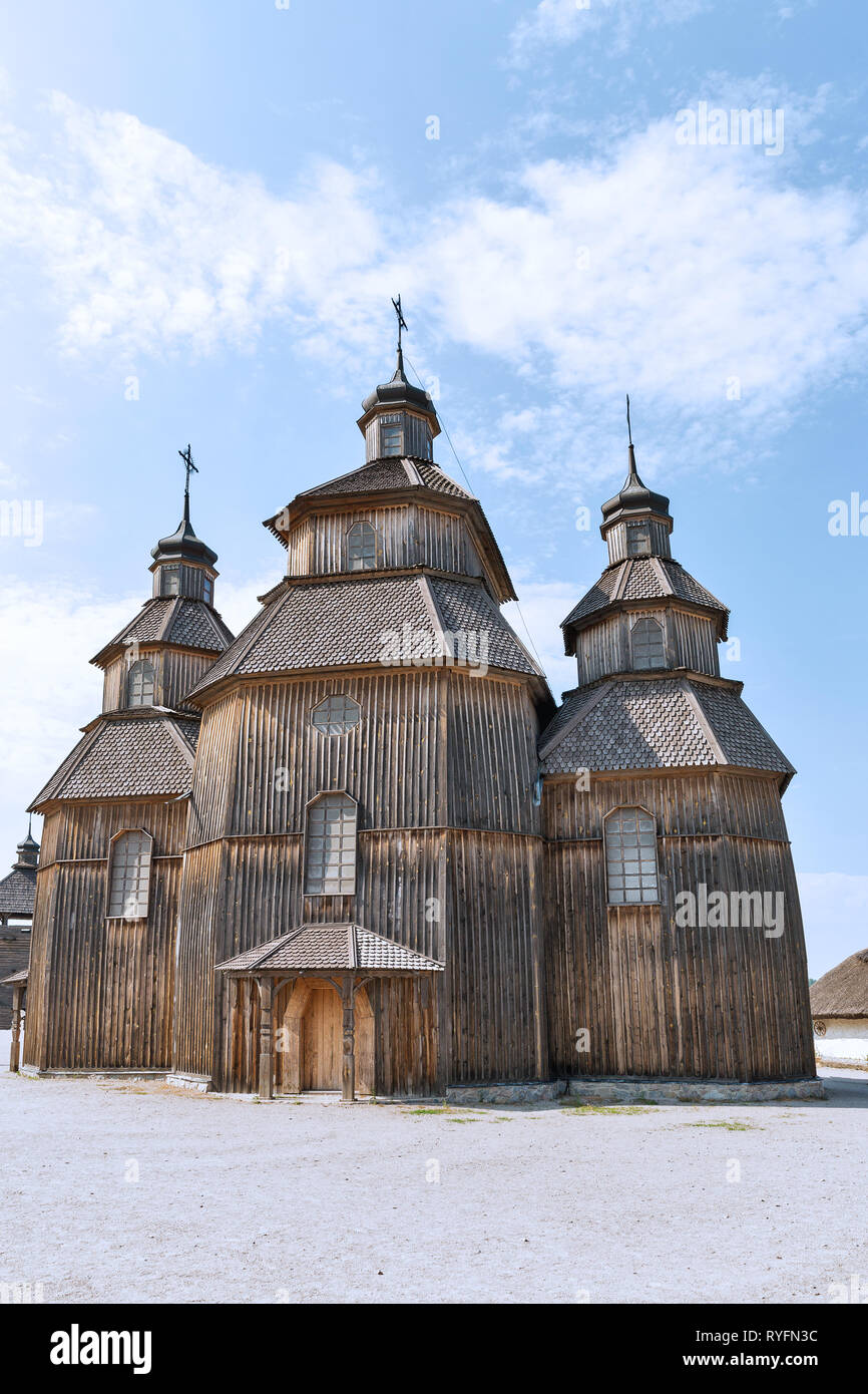 Medieval wooden church, temple of Cossacks. Buildings on Zaporozhskaya Sich on island of Khortytsia in Ukraine. Stock Photo