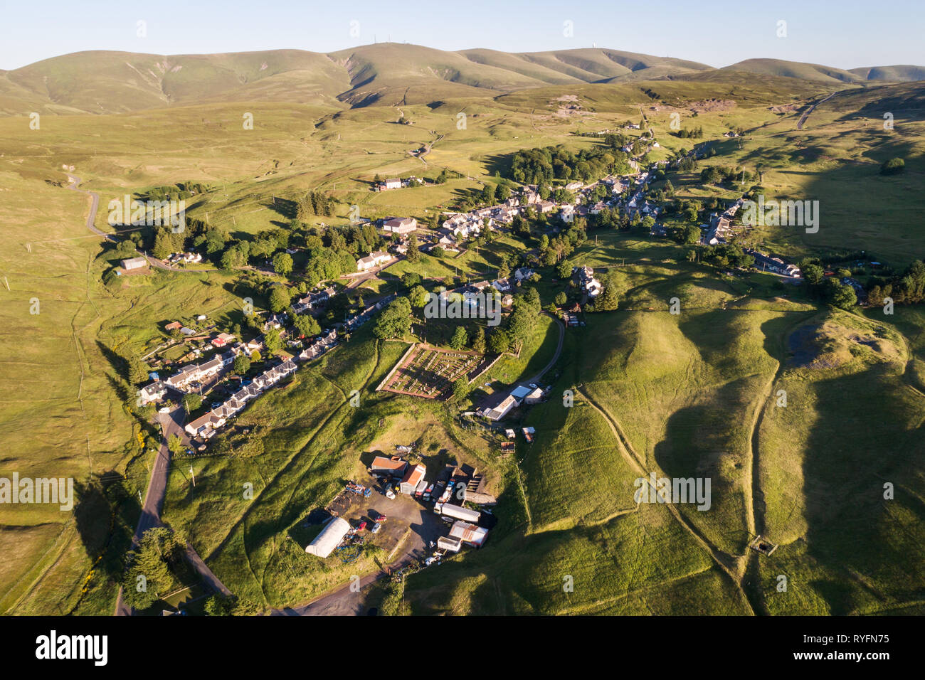 Aerial image of the village of Leadhills, arguably Scotland's highest village, showing historic mining sites and old shafts. Stock Photo