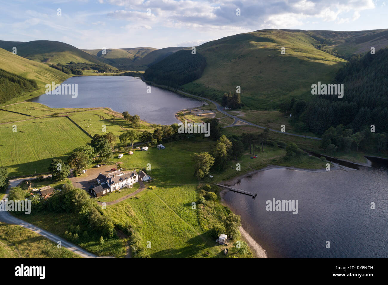 Aerial image of St Mary's Loch and Loch of the Lowes showing surrounding hills from a high vantage point. Stock Photo