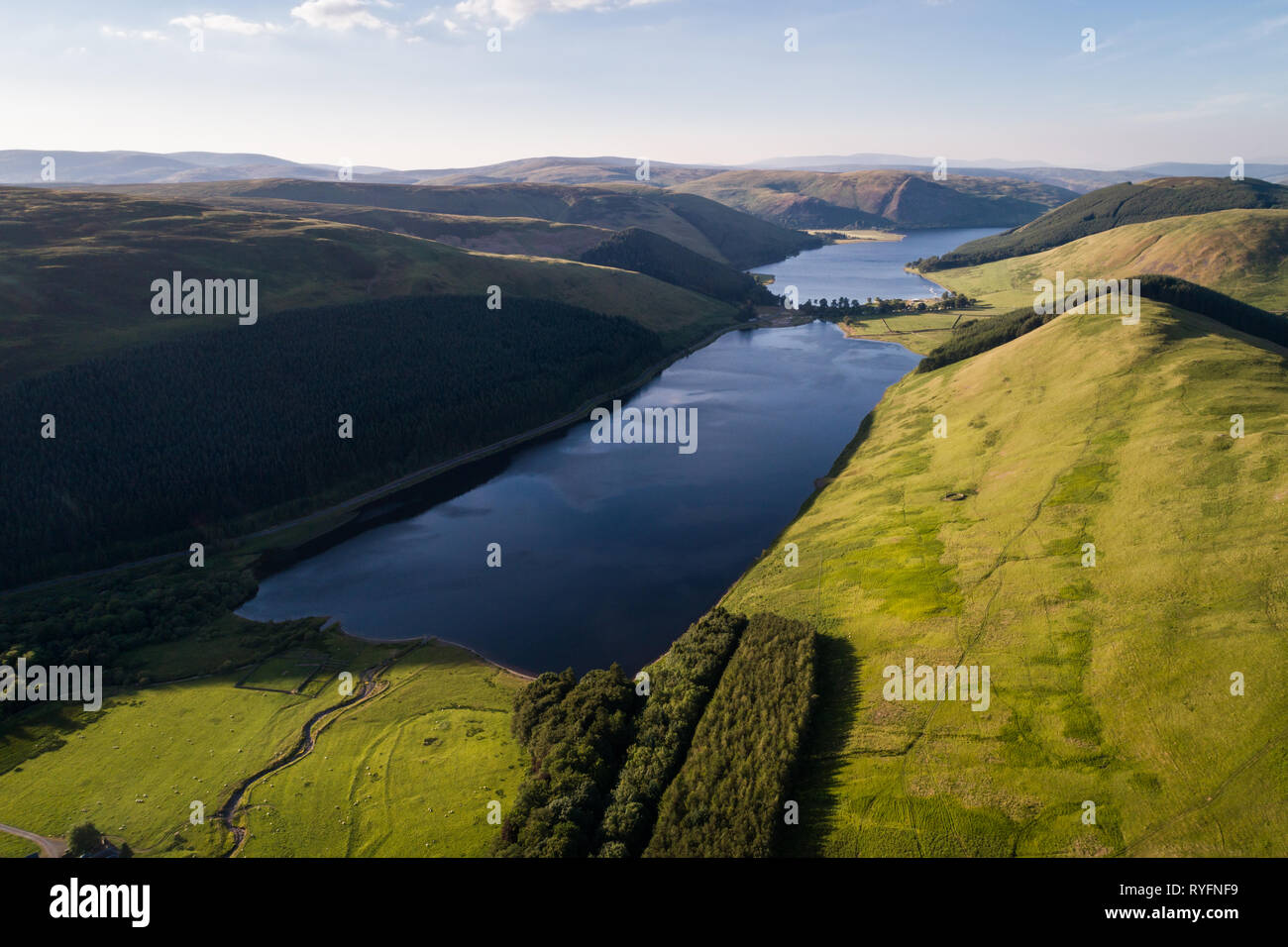 Aerial image of St Mary's Loch and Loch of the Lowes showing surrounding hills from a high vantage point. Stock Photo