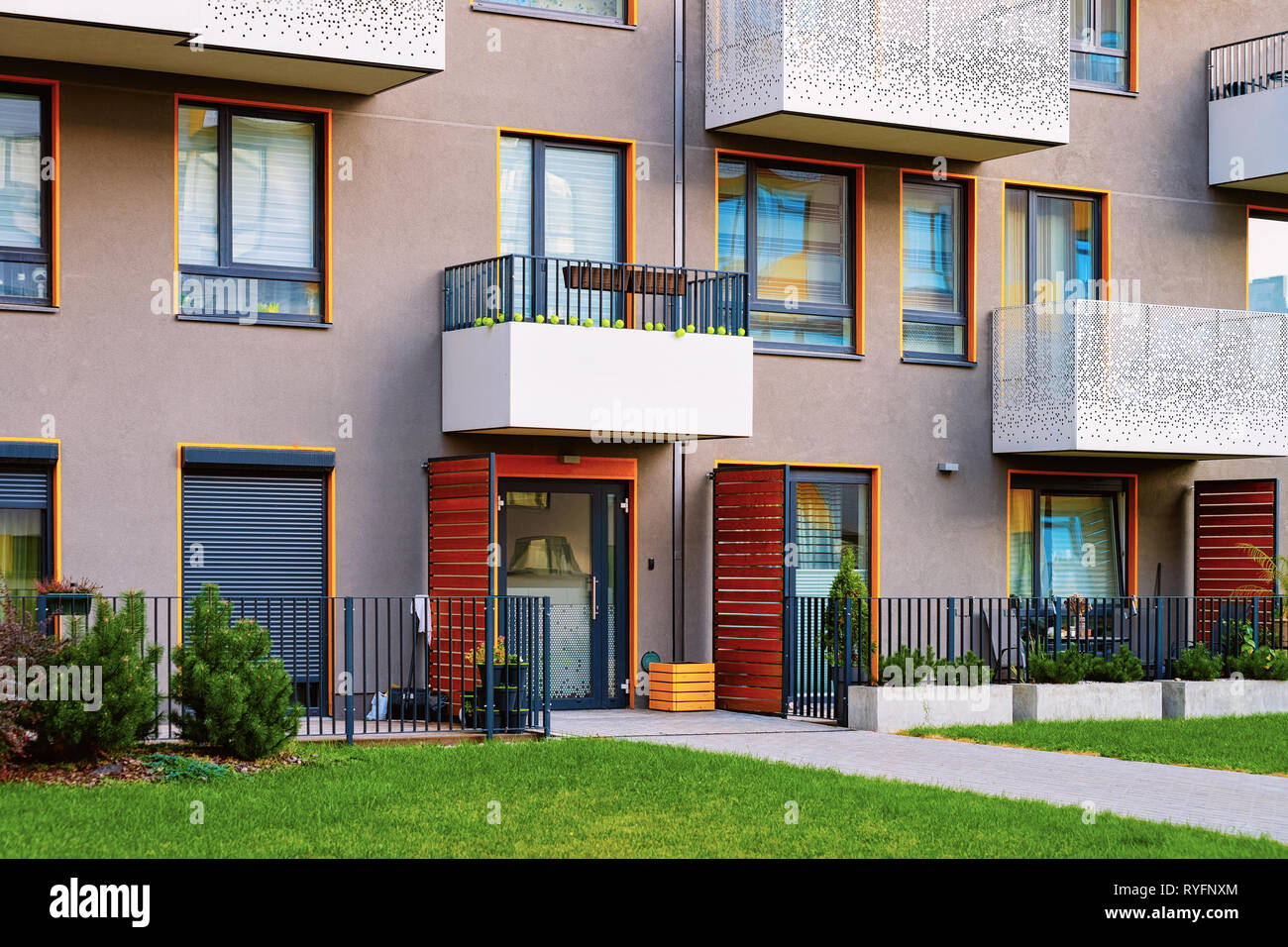 Image showcasing Apartment residential modern house building exterior with entrance gate ...