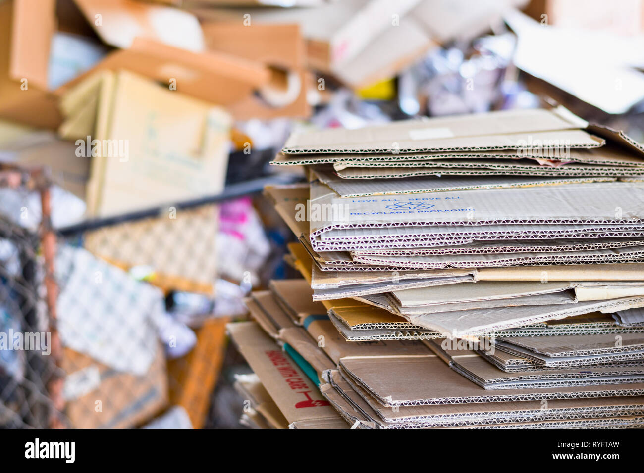 paper packed and cardboard corrugated paper ready to recycle in sorting garbage Stock Photo