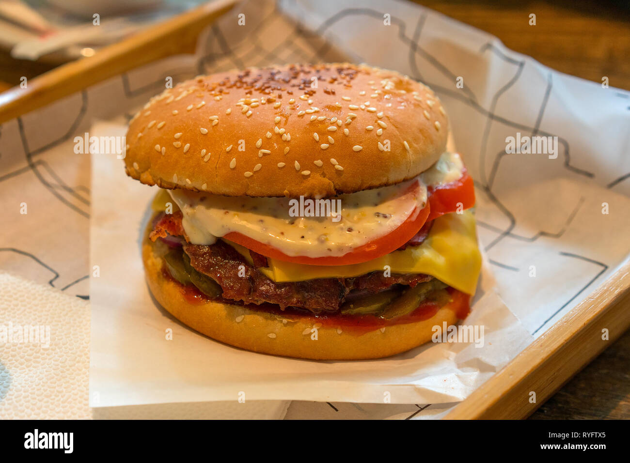 classic american burger on wooden base Stock Photo