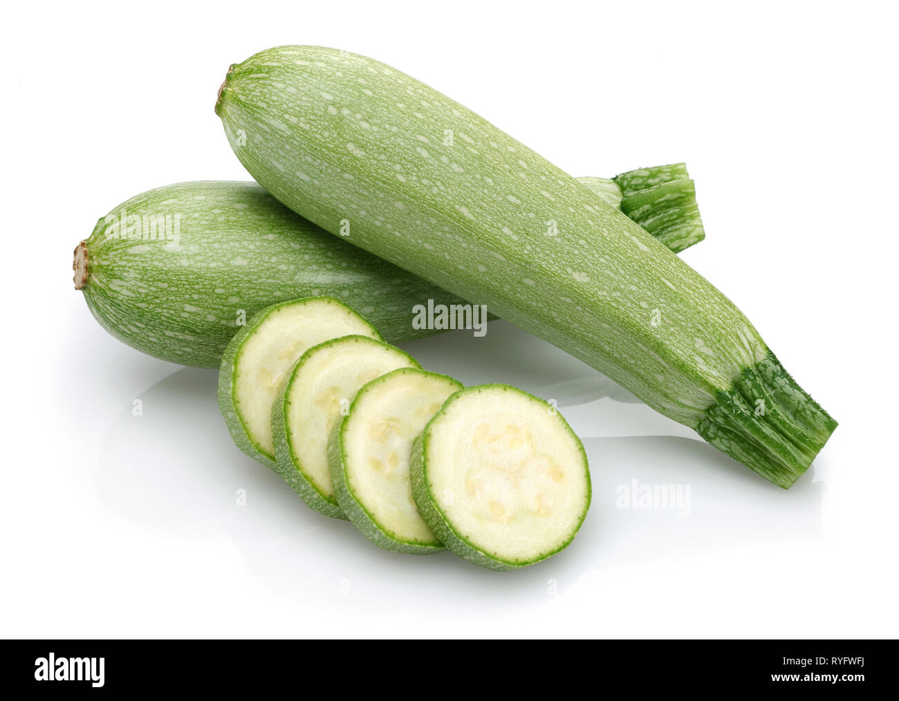 Green zucchini with slices isolated on white background Stock Photo