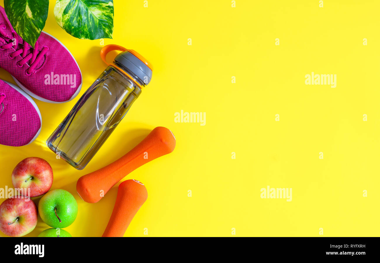 Download Red And Green Apples Bottle Of Water Orange Dumbbells And Red Sport Shoes On Yellow Background Fitness Active Healthy Lifestyle Concept Background Stock Photo Alamy PSD Mockup Templates