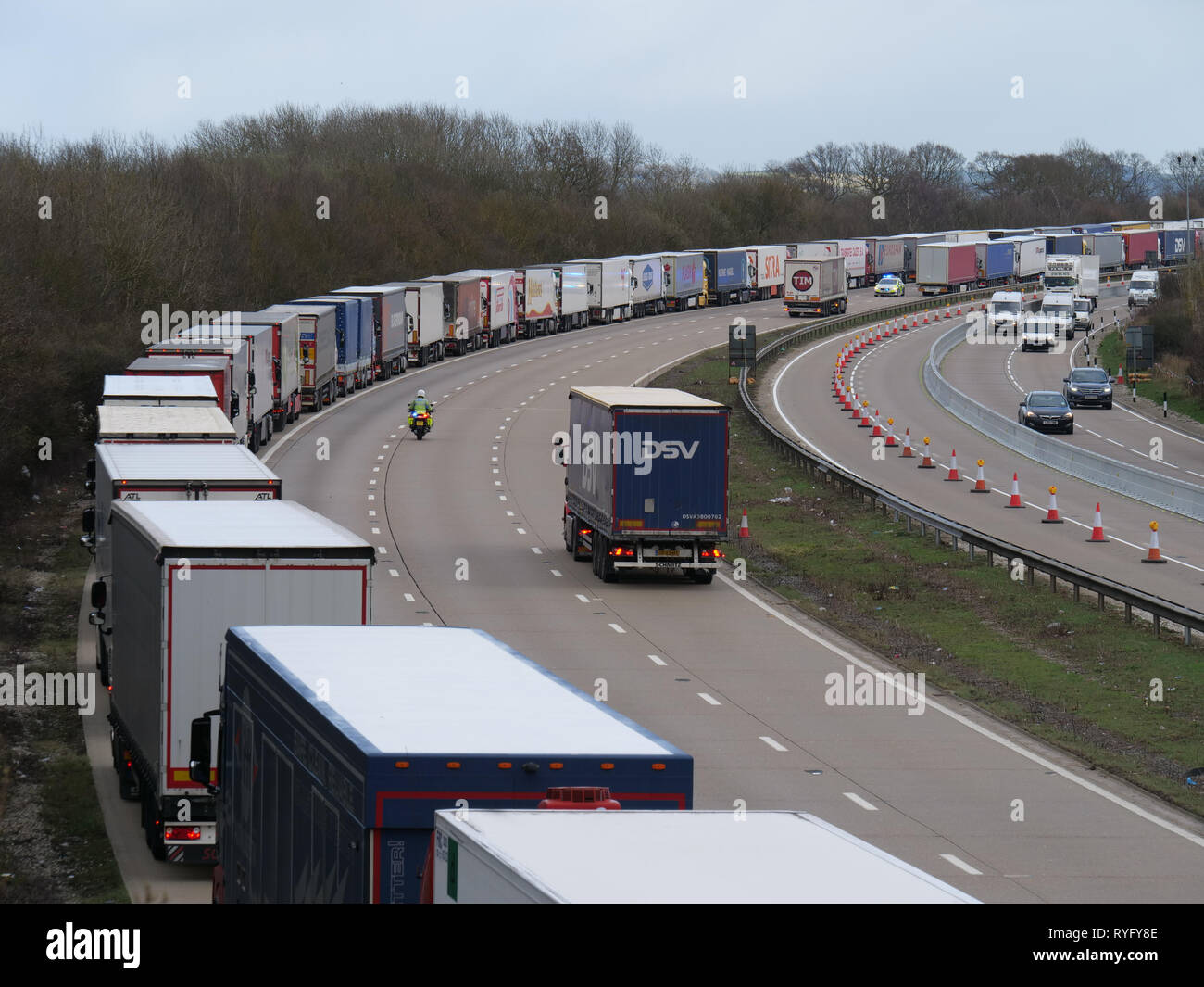 Police initiate operation stack on the M20 motorway, Ashford, Kent due to severe delays at the channel crossings during storm Gareth. Stock Photo