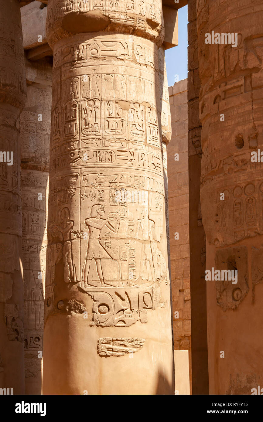 Ancient egyptian carvings on temple columns in Luxor, Egypt Stock Photo