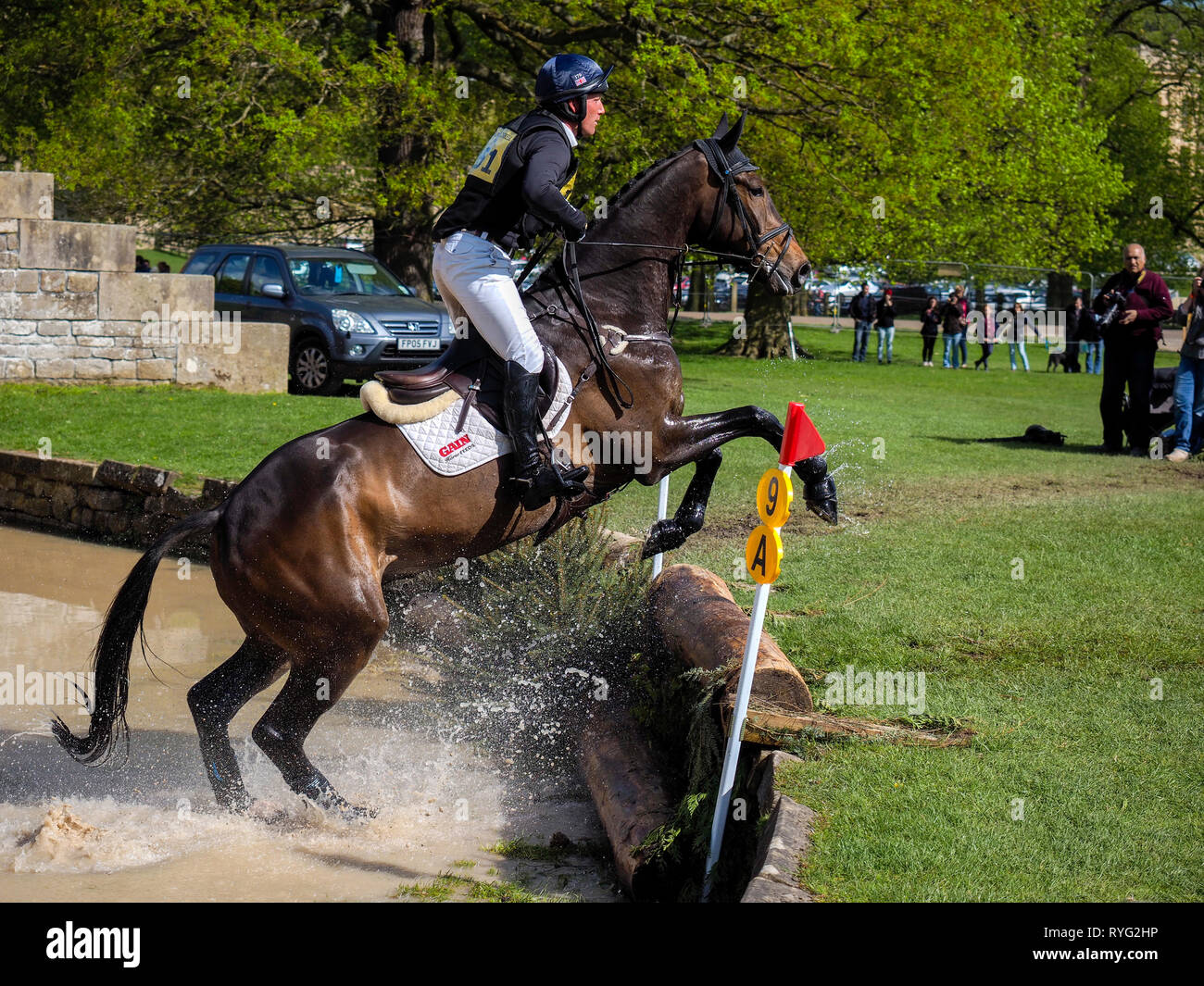 Horse and rider jumping over obstacle Chatsworth Horse trials