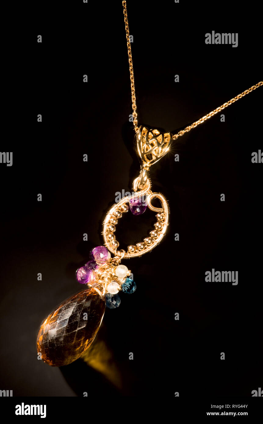 Old vintage necklace with semi-precious stones XXL, light painting, full frame camera macro shot Stock Photo