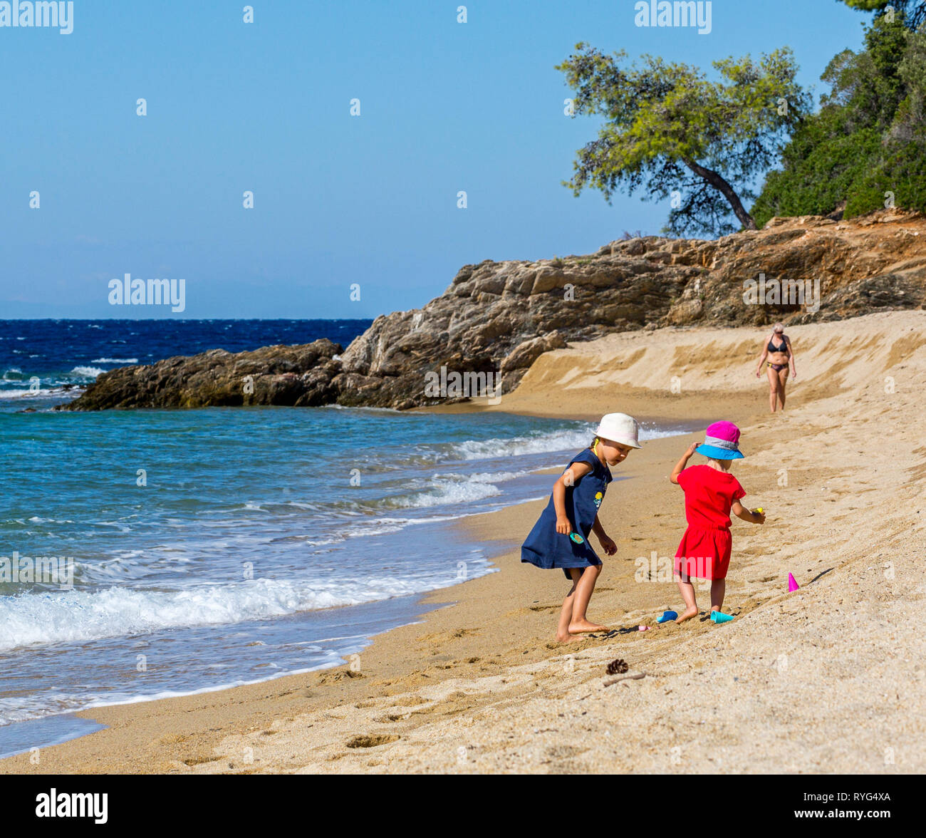 kids-playing-on-the-sea-shore-high-resolution-stock-photography-and