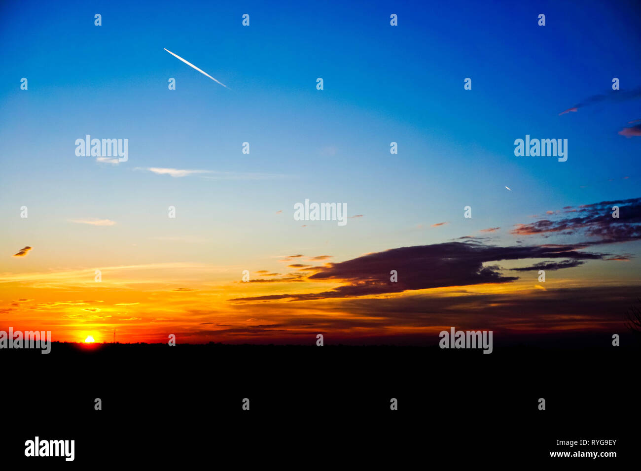 Blue sky and beautifull sunset, planes Stock Photo