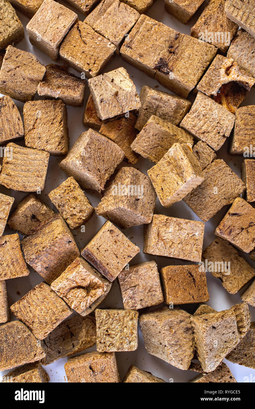 Cubes of freeze dried beef liver treats for dogs and cats. Stock Photo