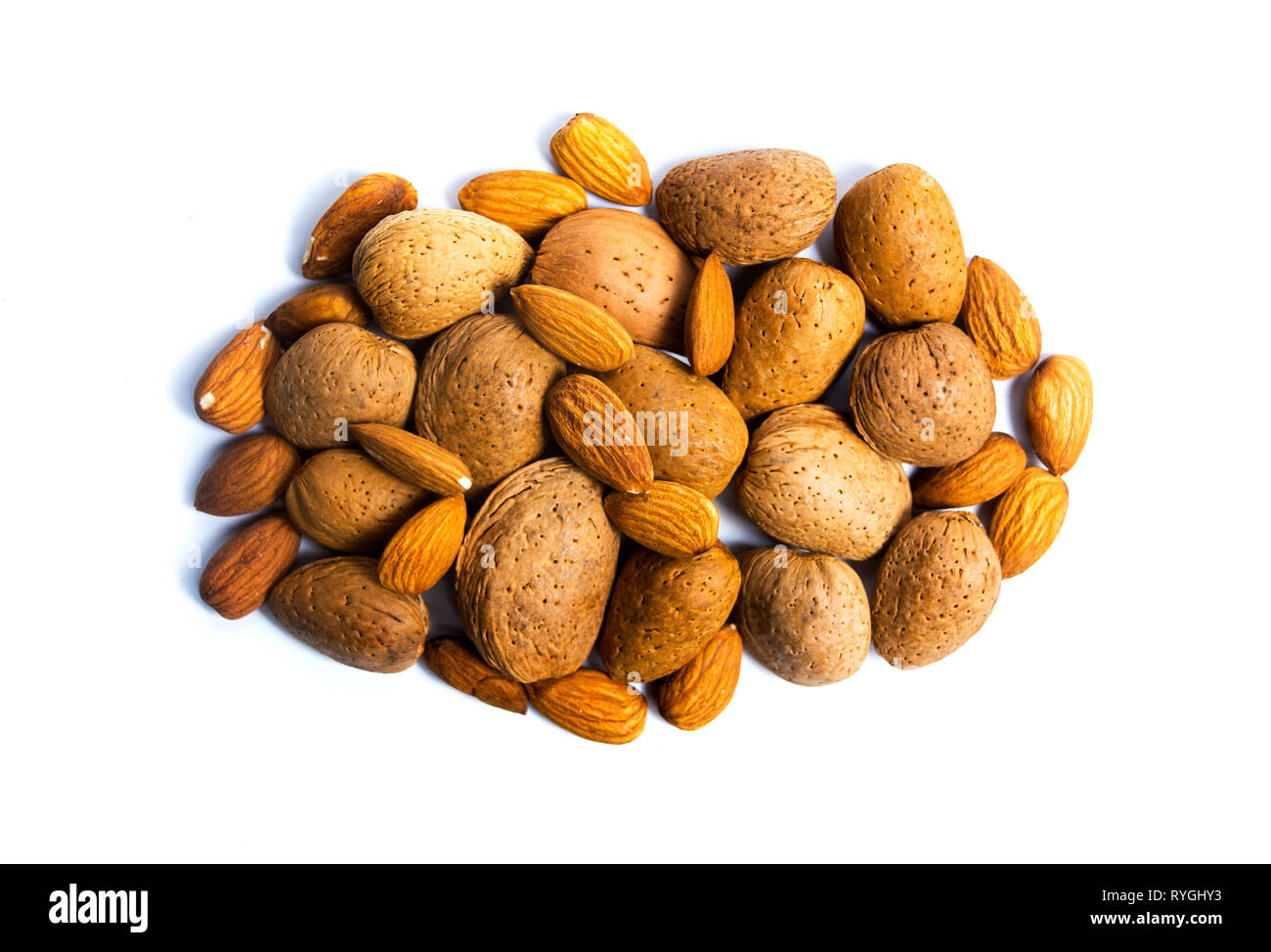 Almonds in shell on white hires stock photography and images Alamy