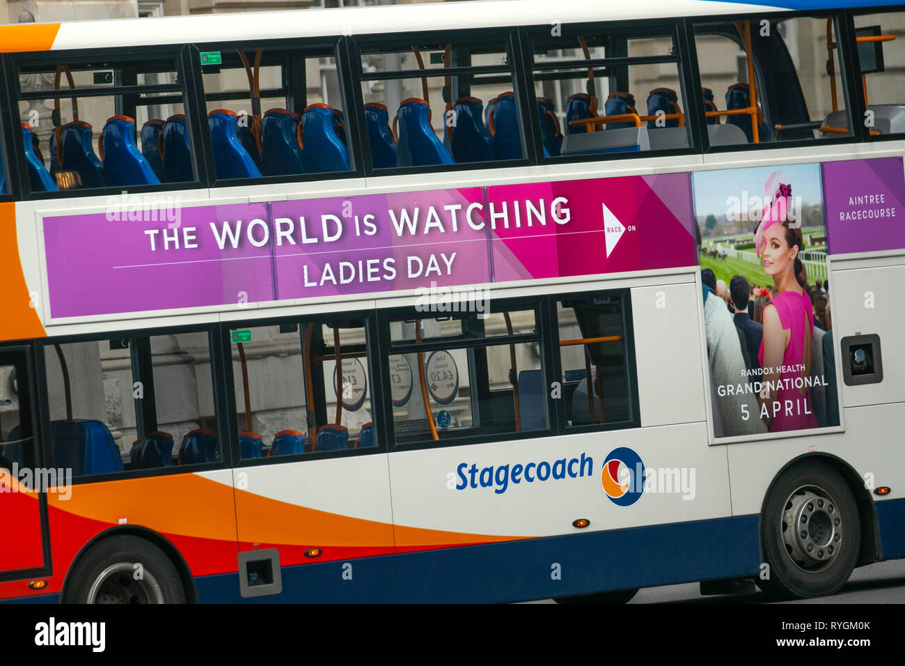 Aintree racecourse Randox Grand National Stagecoach bus advertising Ladies Day in Liverpool City Centre, UK Stock Photo