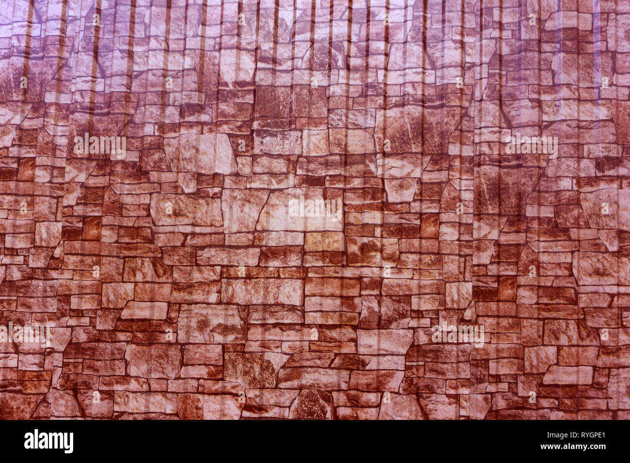 Background wall small light brown textural decorative brick Stock Photo