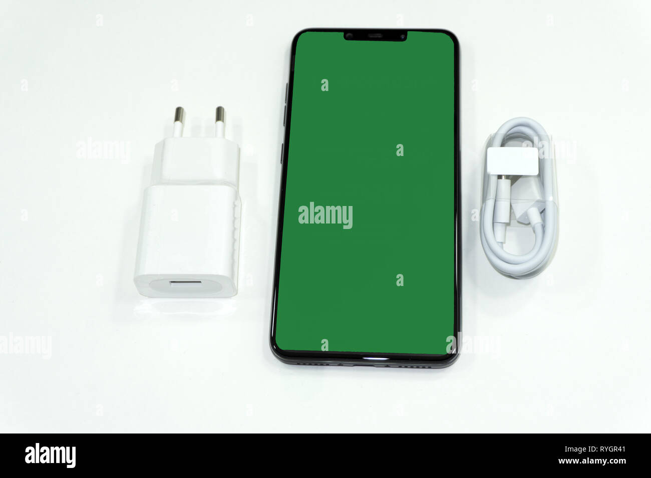 Electric socket with connected phone charger device Stock Photo Alamy