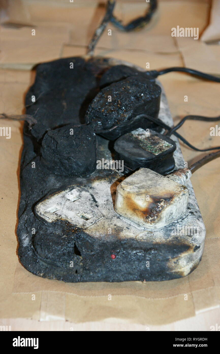overloaded socket, domestic house fire electrical fire Stock Photo