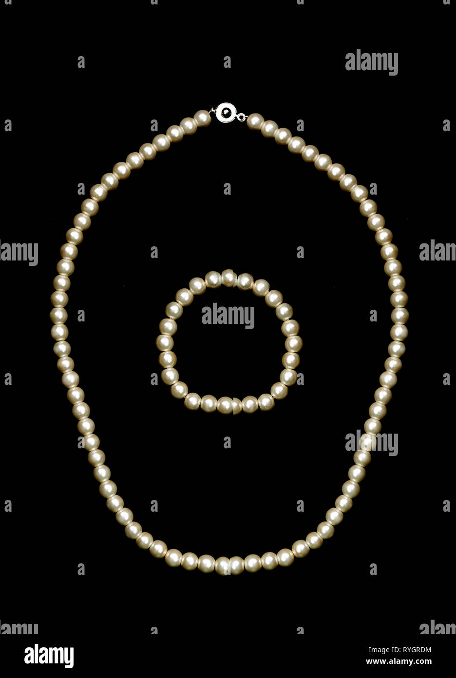 white pearl necklace on black background Stock Photo Alamy