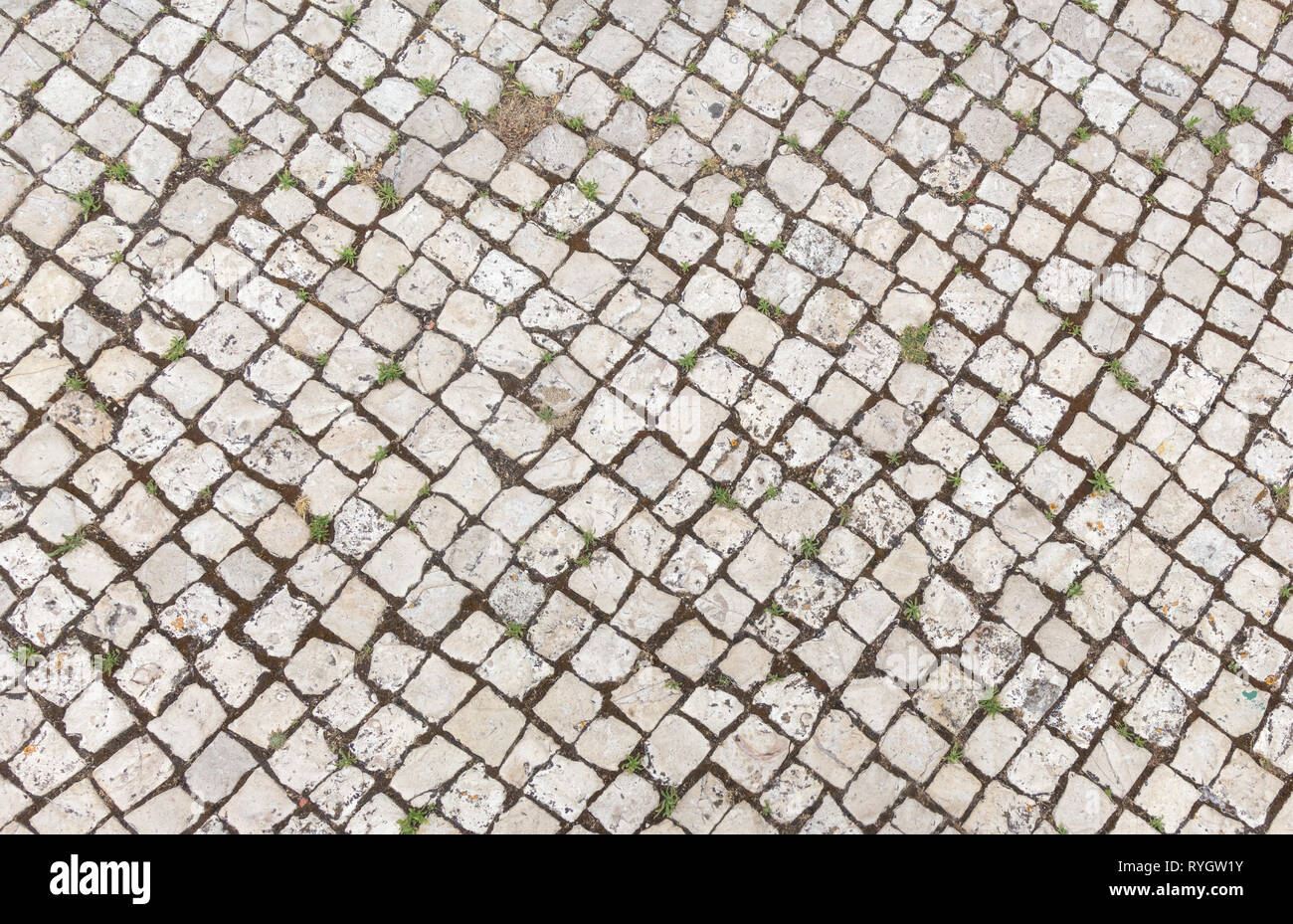 Abstract background of old cobblestone pavement close-up Stock Photo ...