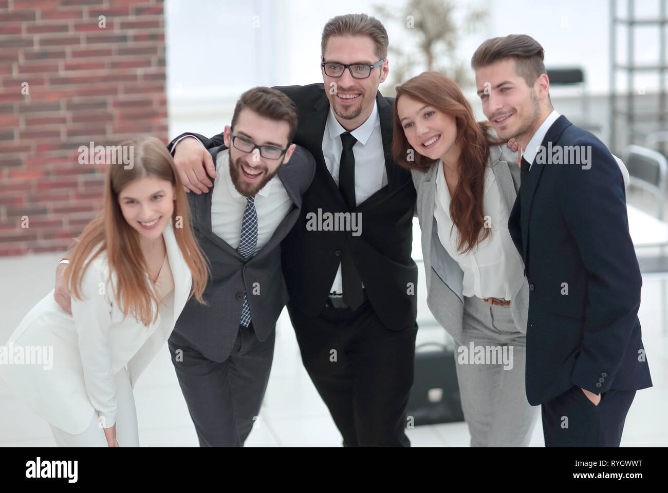 happy business team standing together Stock Photo - Alamy