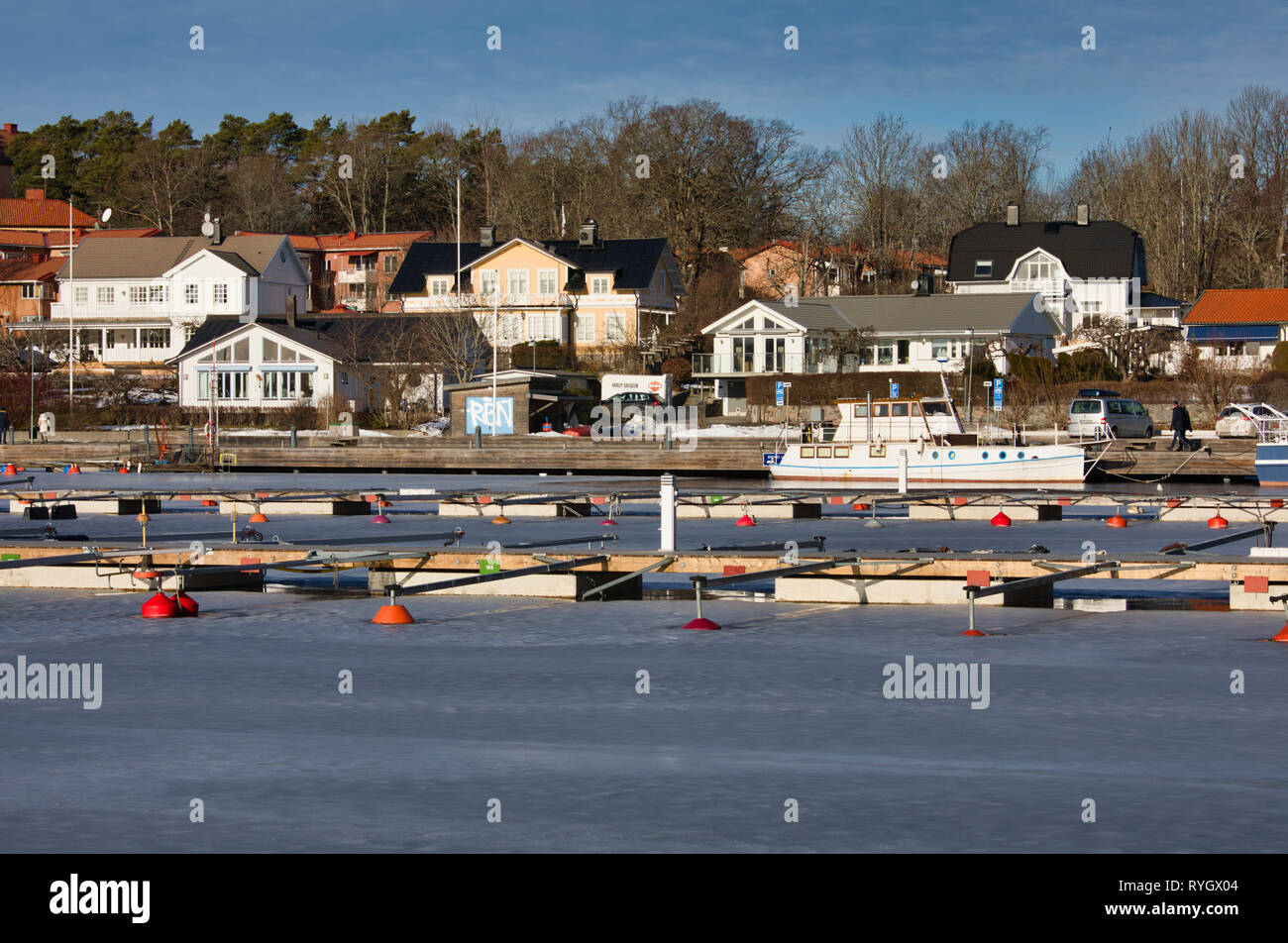 Houses and frozen harbour in Sigtuna the oldest town in Sweden, Scandinavia Stock Photo