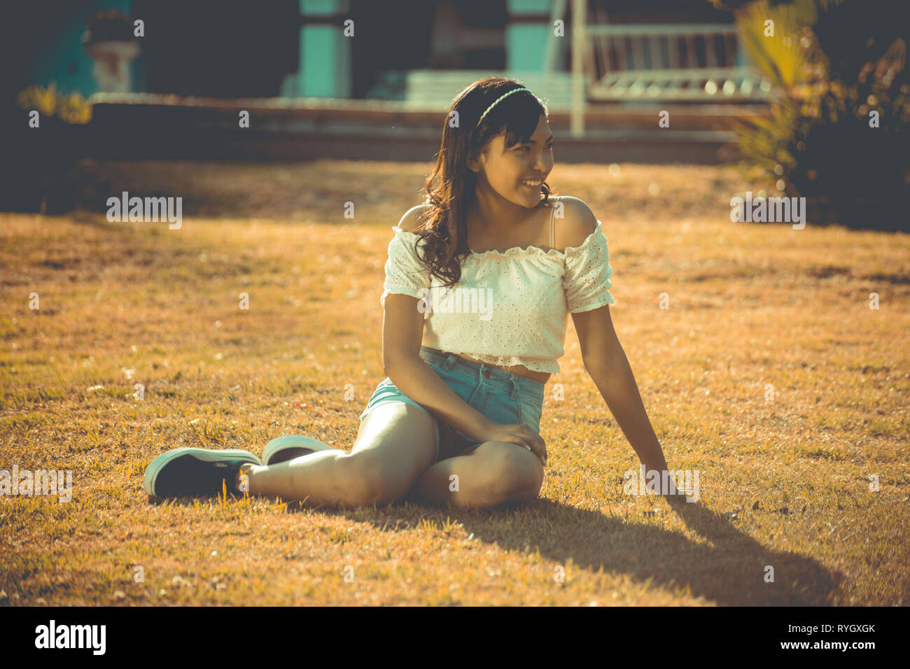 Girl modeling with flowers bouquet Stock Photo Alamy