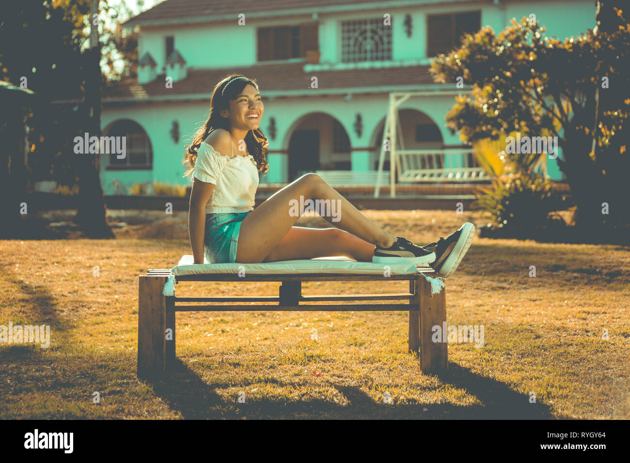 Girl modeling with flowers bouquet Stock Photo Alamy
